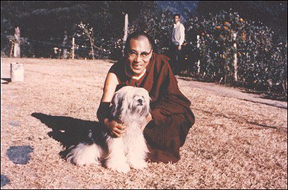 14th Dalai Lama with his puppy