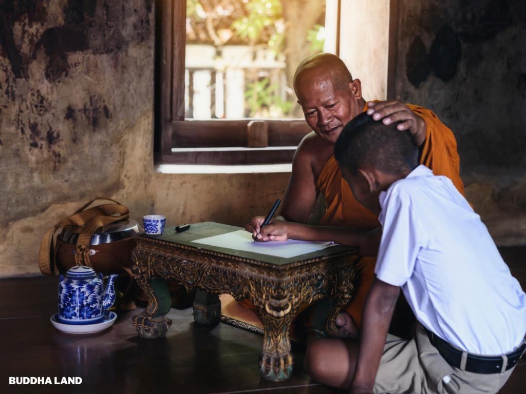 buddhist teacher and student in a cave or a small room studying Buddhism Theravada Buddhism